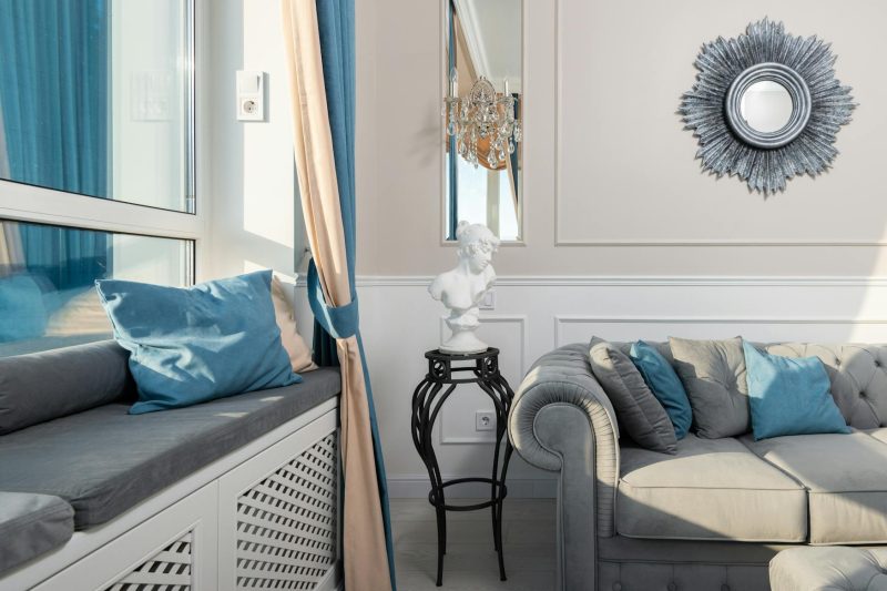 Contemporary room interior with decorative cushions on sofa