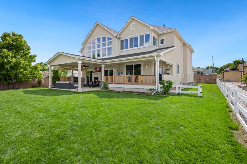 Beautiful twostory suburban house with a large green lawn